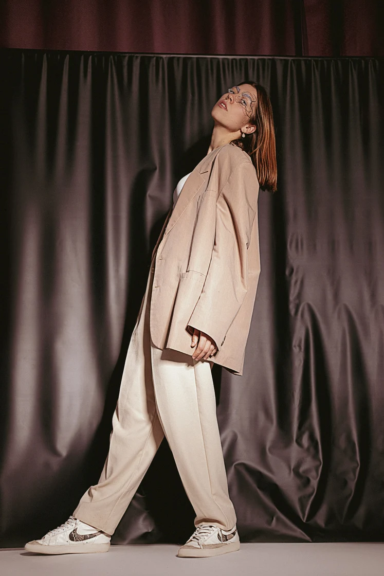 Flowing cream runway look featured in the Design Days brochure